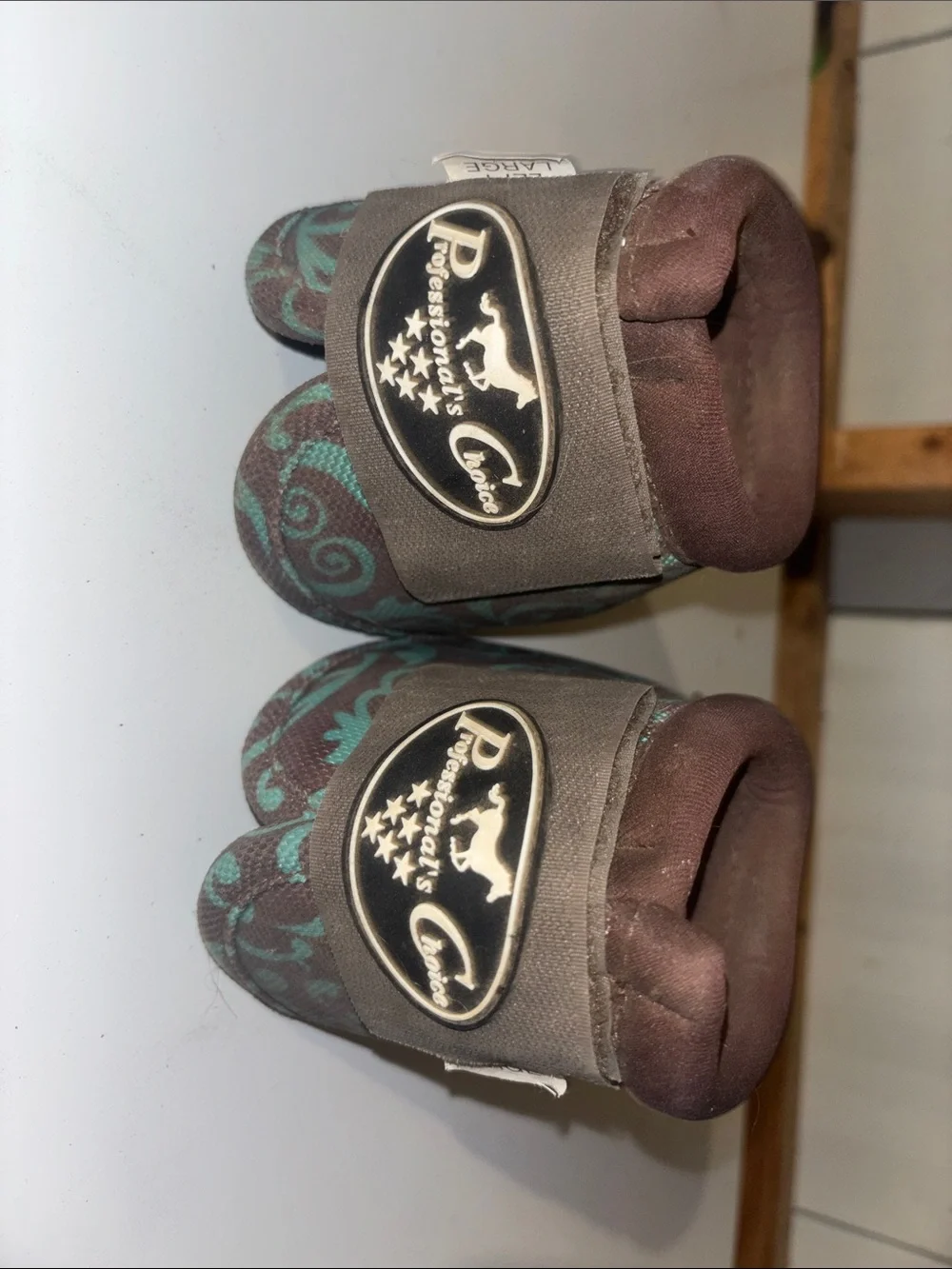 Brown and Teal Patterned Professionals Choice Horse Bell Boots.